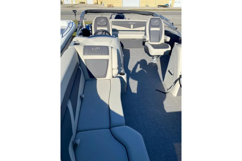 Slide: The Image of 2022 Barletta Cabrio 22UC boat interior with gray seating and modern design. - 9