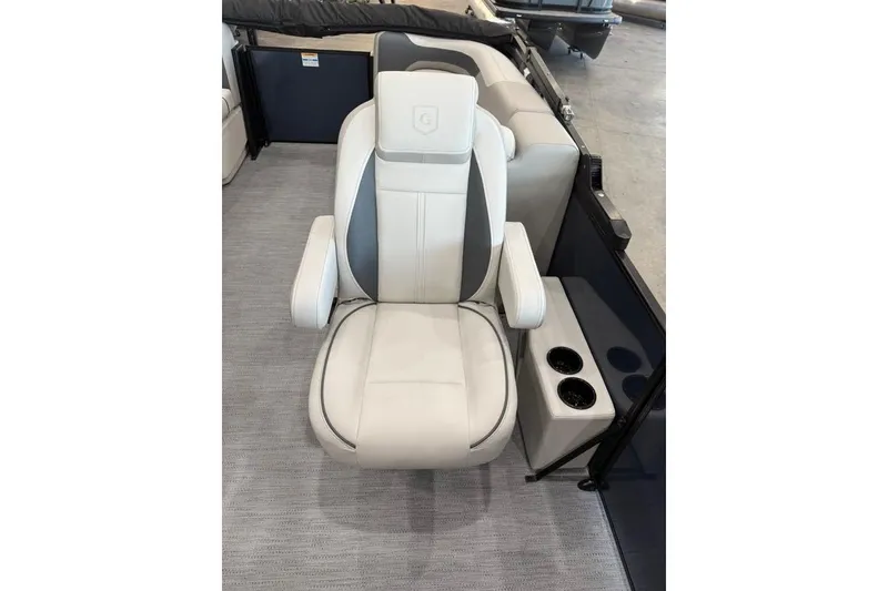 Slide: The Image of 2026 Godfrey SWEETWATER 2286 SB boat seat with armrests and cup holders. - 10