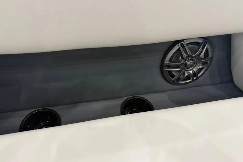 Slide: The Image of 2026 Godfrey SWEETWATER 2286 SB interior with speaker and cup holders. - 15