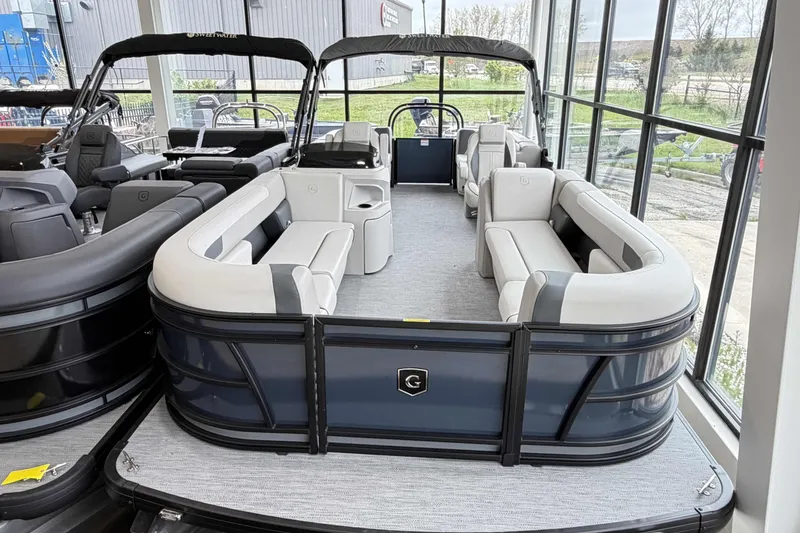 Slide: The Image of 2026 Godfrey SWEETWATER 2286 SB boat interior seating, beige upholstery, modern design. - 18