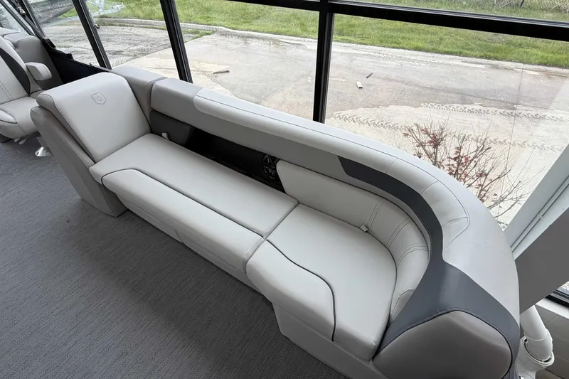 Slide: The Image of 2026 Godfrey SWEETWATER 2286 SB boat interior with open storage compartment. - 19