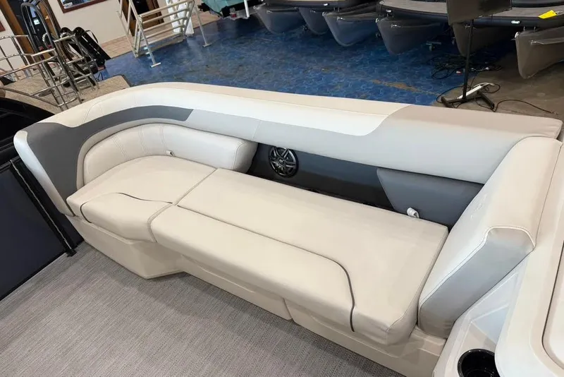 Slide: The Image of 2026 Godfrey SWEETWATER 2286 SB boat interior with sleek, modern seating design. - 5