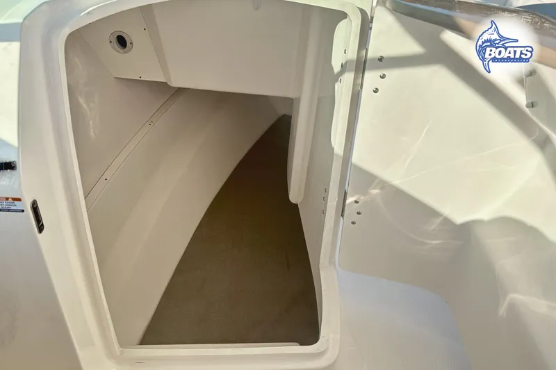Slide: The Image of 2019 Robalo R317 Dual Console storage compartment interior view. - 8