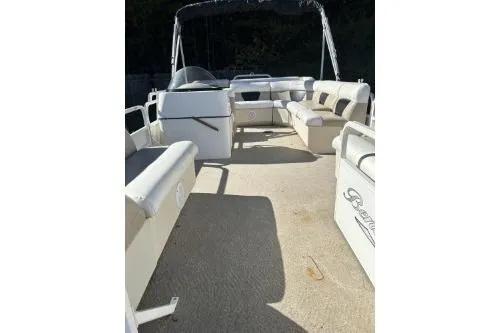 Slide: The Image of 2009 Bennington Cruise 20 pontoon boat interior with spacious seating and canopy. - 3