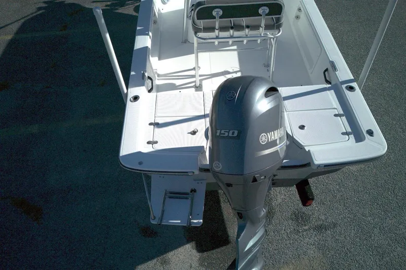 Slide: The Image of 2017 Frontier 2104 boat with Yamaha 150 outboard motor, rear view. - 2