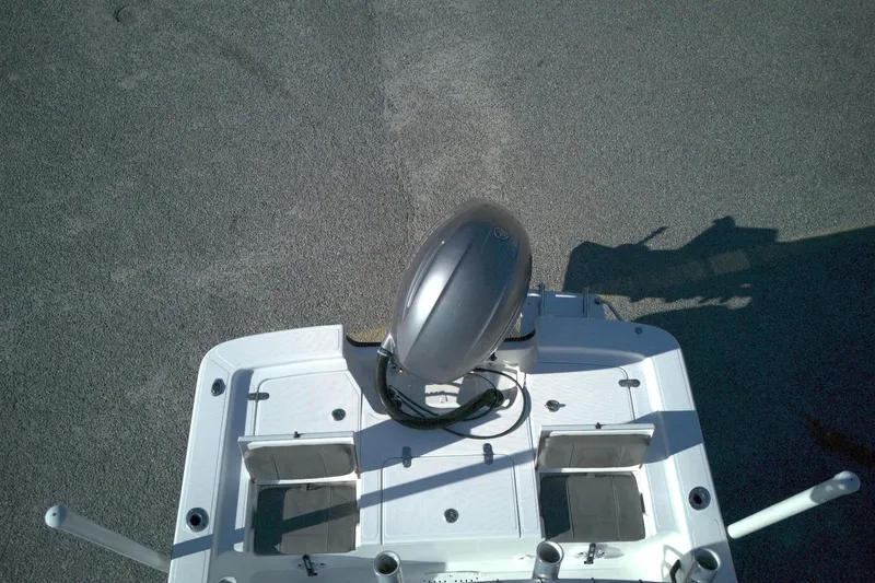 Slide: The Image of Overhead view of a 2017 Frontier 2104 boat with motor and seating. - 6