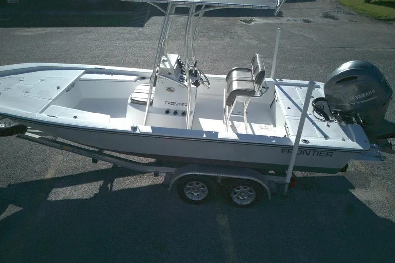 Slide: The Image of 2017 Frontier 2104 boat on trailer with Yamaha outboard motor. - 7