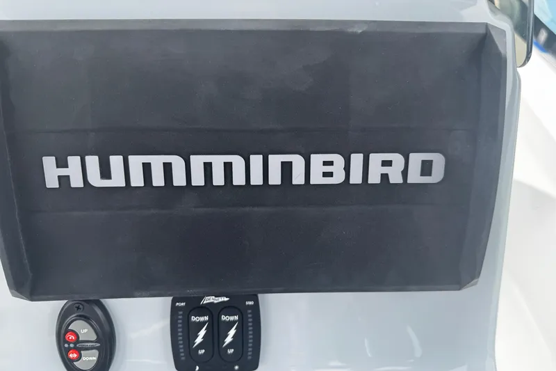 Slide: The Image of Control panel of 2026 Piranha Casador B2200 featuring Humminbird electronics. - 18