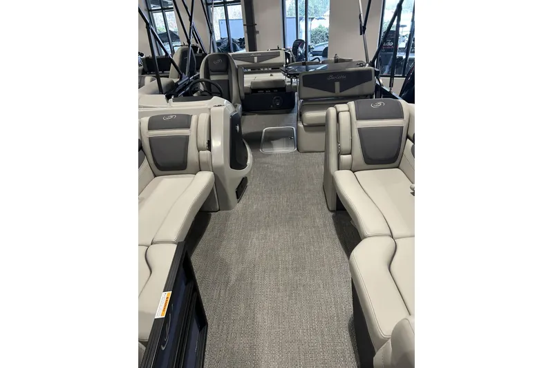 Slide: The Image of 2025 Barletta C24UE pontoon boat interior with luxurious seating and modern design. - 8