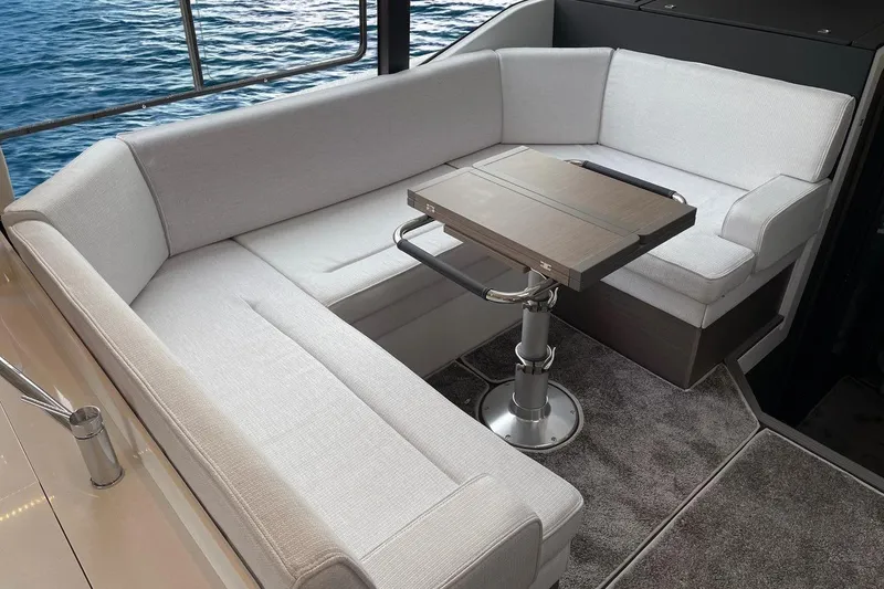 Slide: The Image of Luxurious seating area on 2026 Jeanneau NC1295 Coupe yacht with ocean view. - 3