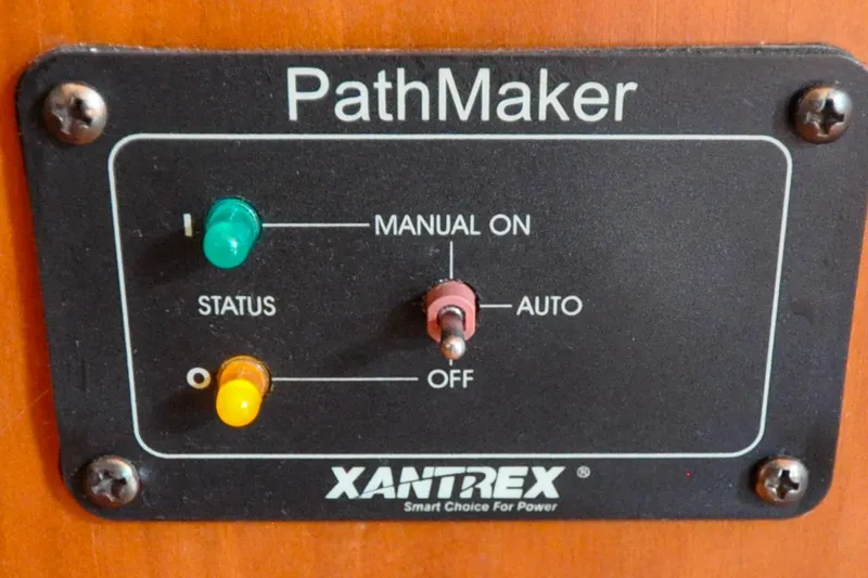 Slide: The Image of PathMaker control panel with manual, auto, and status indicators on Sabre 426, 2004 model. - 101
