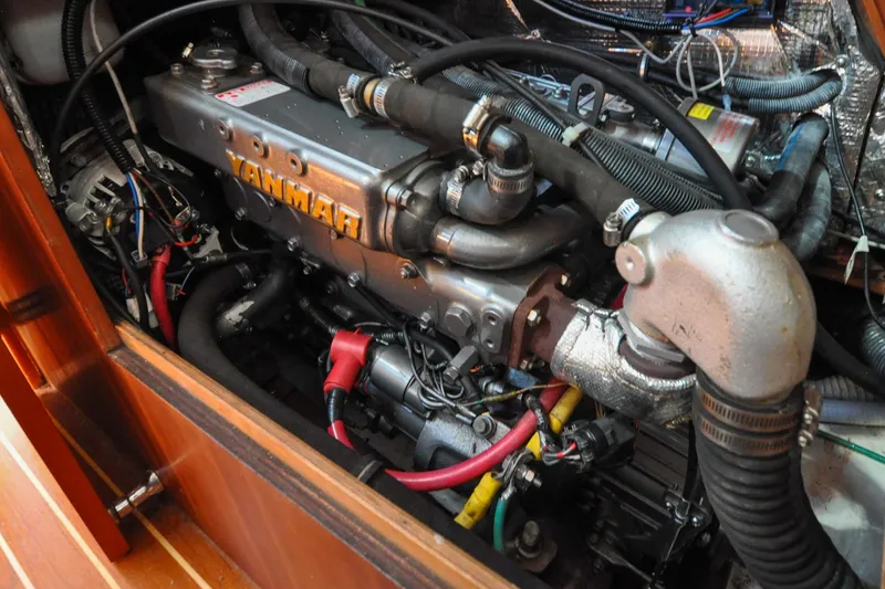 Slide: The Image of Engine compartment of a 2004 Sabre 426 sailboat with Yanmar engine. - 112