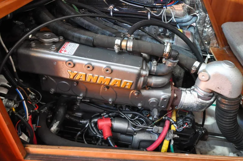 Slide: The Image of Yanmar engine in 2004 Sabre 426 sailboat, showcasing detailed mechanical components. - 113