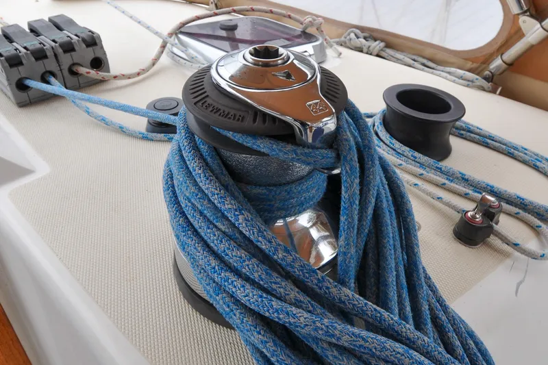 Slide: The Image of Sailing winch with blue rope on 2004 Sabre 426 yacht deck. - 13