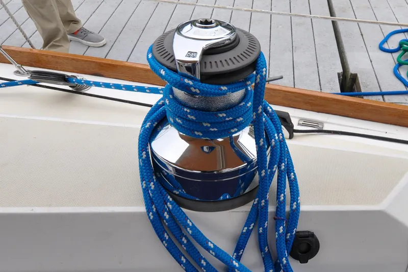 Slide: The Image of Winch with blue rope on 2004 Sabre 426 sailboat deck. - 14
