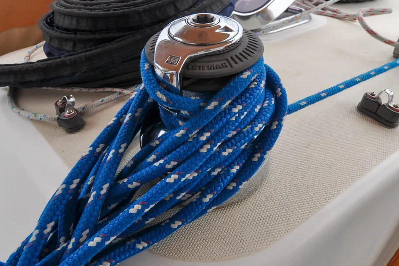 Slide: The Image of Blue rope coiled on a winch aboard a 2004 Sabre 426 sailboat. - 21