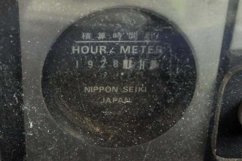 Slide: The Image of Hour meter display on Sabre 426, 2004 model, showing 1928 hours, Nippon Seiki Japan. - 29