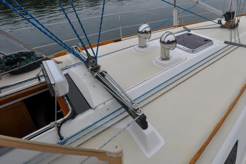 Slide: The Image of Deck of 2004 Sabre 426 sailboat with rigging and ventilation domes. - 34