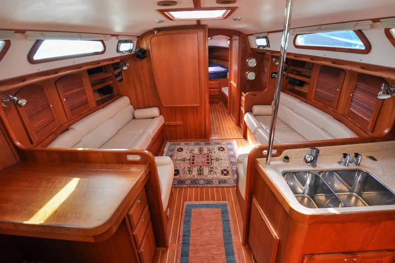 Slide: The Image of Luxurious interior of 2004 Sabre 426 yacht with wood finish and modern amenities. - 47