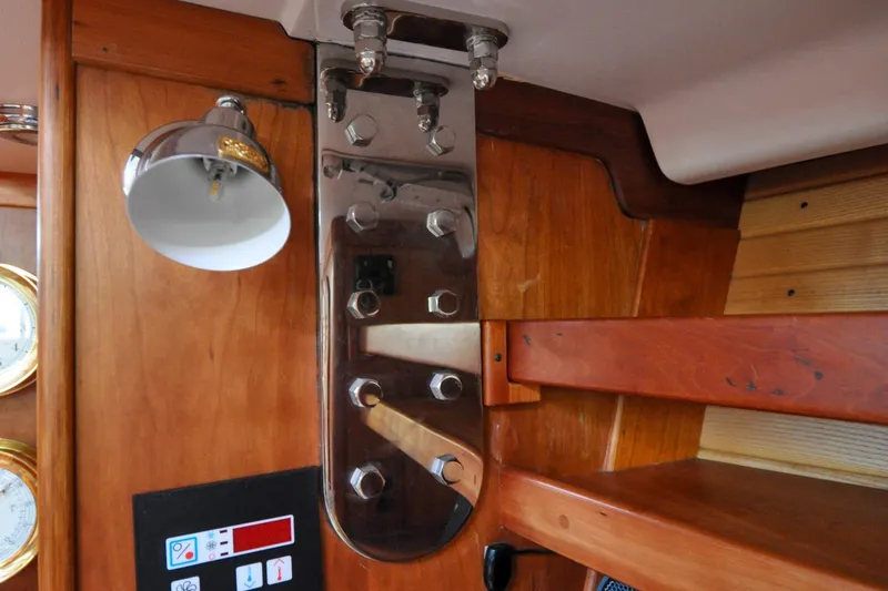 Slide: The Image of Interior of 2004 Sabre 426 yacht with wooden finish and chrome fixtures. - 61