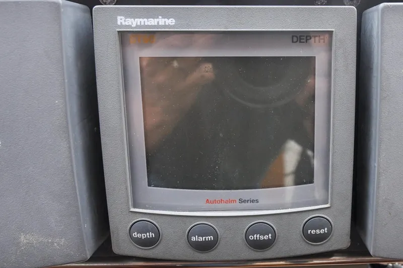 Slide: The Image of Raymarine ST60 depth display on 2004 Sabre 426 yacht dashboard. - 9