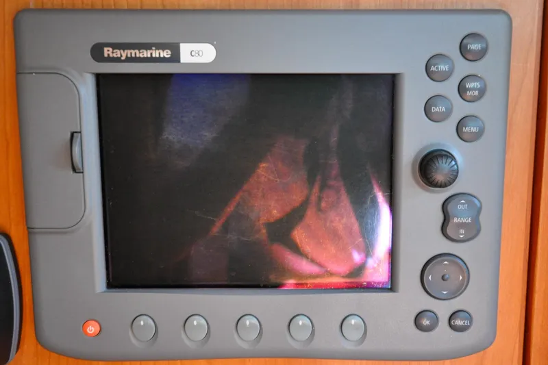 Slide: The Image of Raymarine C80 marine display on 2004 Sabre 426 yacht dashboard. - 96