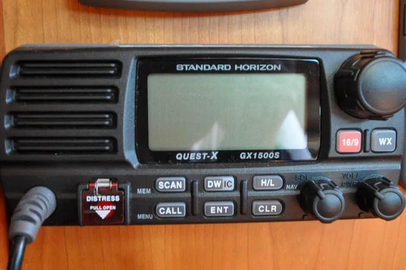 Slide: The Image of Standard Horizon GX1500S marine radio on 2004 Sabre 426 yacht dashboard. - 98