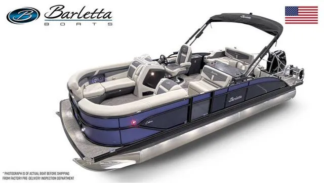 Slide: The Image of 2025 Barletta Boats C24UE pontoon with sleek design and luxurious seating. - 2