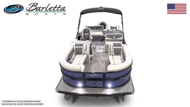 Slide: The Image of 2025 Barletta Boats C24UE pontoon with luxurious seating and sleek design, front view. - 5