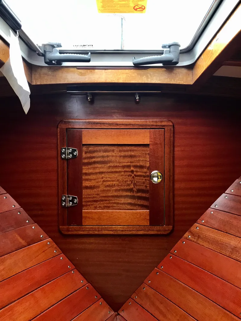 Slide: The Image of Interior of 2020 Custom Windlea Runabout boat with wooden finish and hatch. - 12