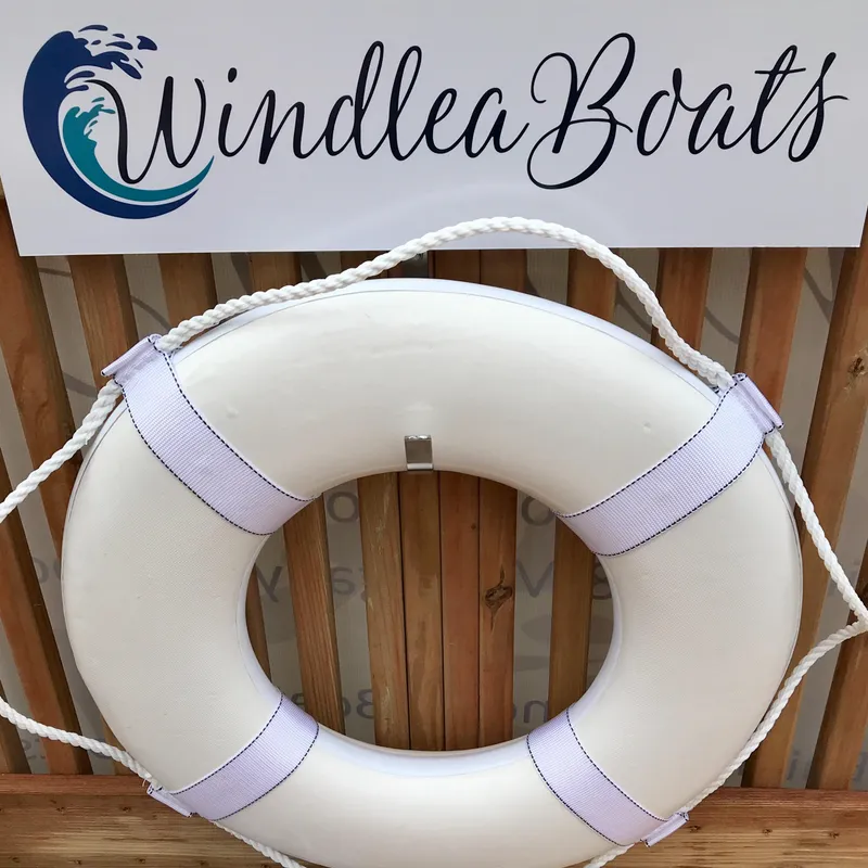 Slide: The Image of White lifebuoy with Windlea Boats logo, showcasing Custom Windlea Runabout 2020. - 33
