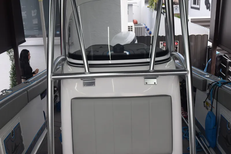 Slide: The Image of 2022 Aquasport 2300 Center Console boat interior with stainless steel frame. - 58