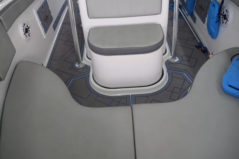 Slide: The Image of 2022 Aquasport 2300 Center Console boat interior with gray seating and blue accents. - 59
