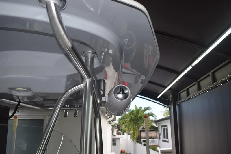 Slide: The Image of 2022 Aquasport 2300 Center Console boat detail under canopy. - 62