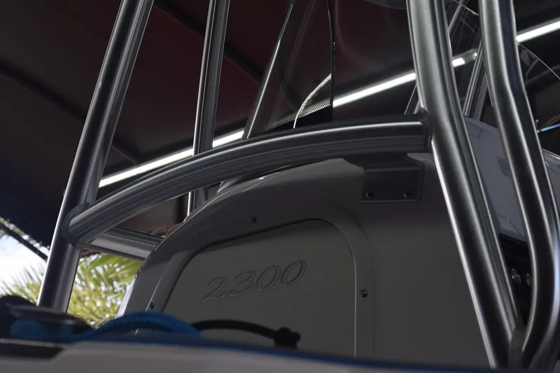 Slide: The Image of 2022 Aquasport 2300 Center Console boat with stainless steel frame detail. - 75