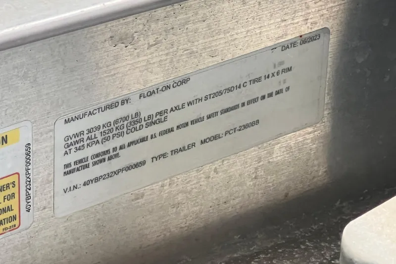 Slide: The Image of Label on trailer by Float-On Corp, detailing specifications and compliance information. - 83