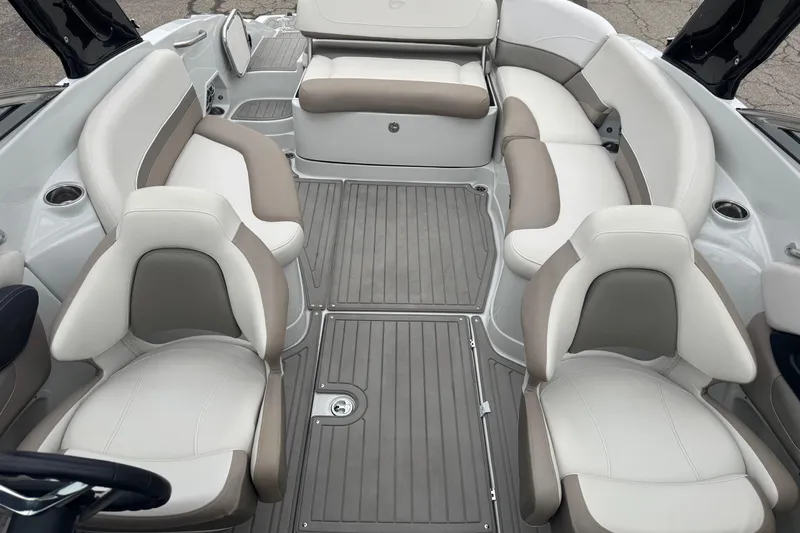 Slide: The Image of 2019 Crownline 275 SS boat interior with spacious seating and modern design. - 15