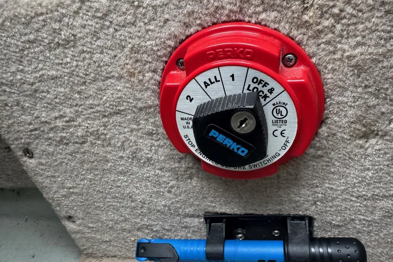 Slide: The Image of Red Perko marine battery switch on 2019 Crownline 275 SS boat. - 20