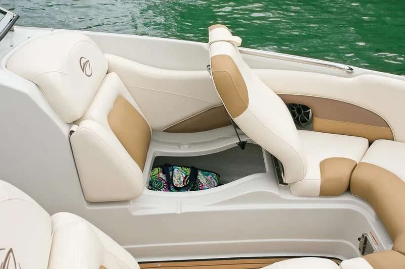 Slide: The Image of 2019 Crownline 275 SS boat audio controls and warning label on deck. - 5