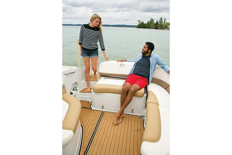 Slide: The Image of 2019 Crownline 275 SS boat dashboard with steering wheel and control panel. - 8