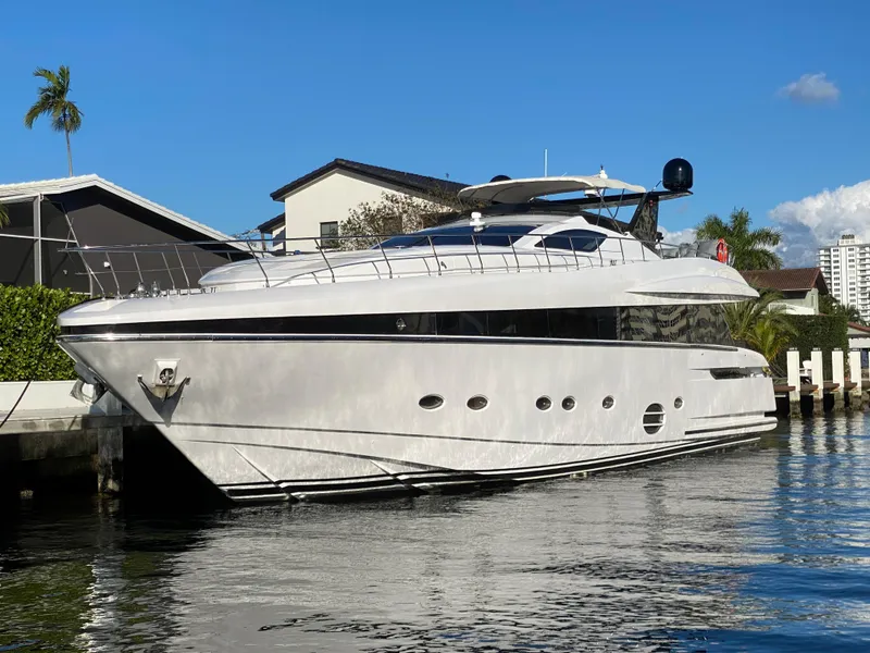 Slide: The Image of Luxury 2007 Rodriquez 80 Widebody yacht docked by waterfront homes. - 2