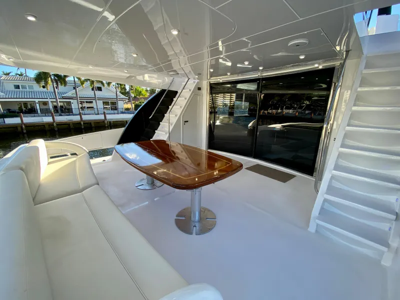 Slide: The Image of Luxurious 2007 Rodriquez 80 Widebody yacht deck with elegant seating and table. - 20