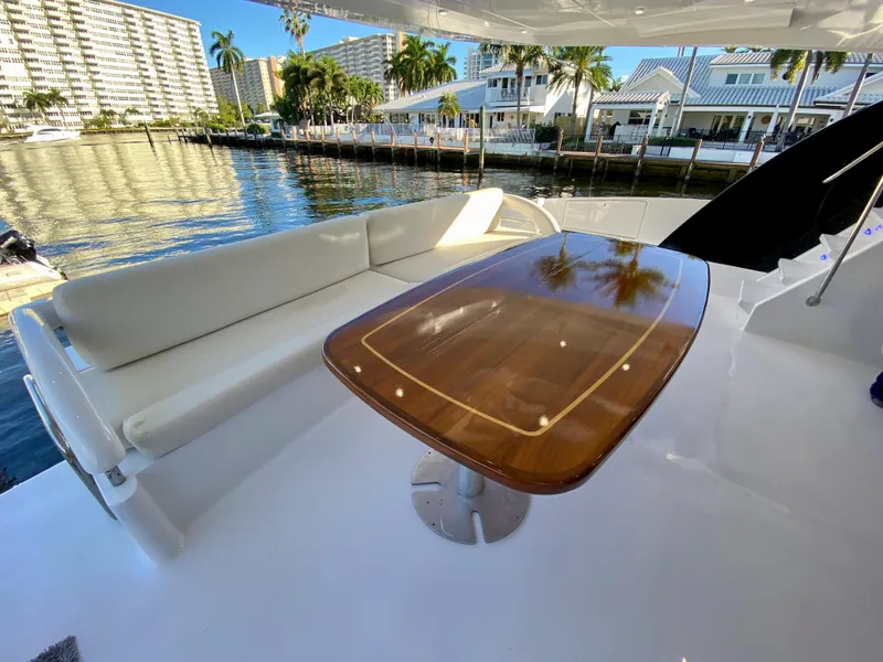 Slide: The Image of Luxurious 2007 Rodriquez 80 Widebody yacht with elegant deck seating and polished wooden table. - 21