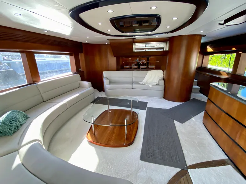Slide: The Image of Luxurious interior of a 2007 Rodriquez 80 Widebody yacht with elegant seating and modern design. - 24