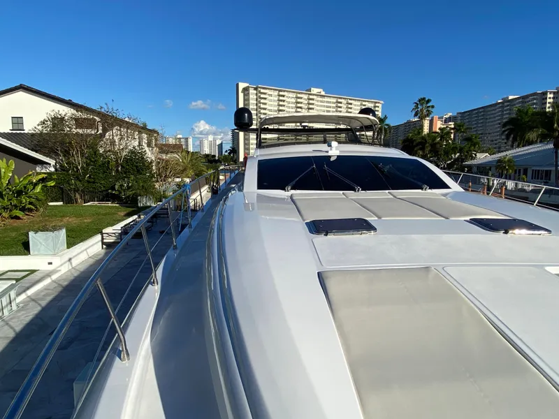 Slide: The Image of Luxury 2007 Rodriquez 80 Widebody yacht docked in sunny marina setting. - 4