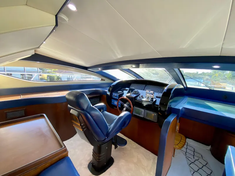 Slide: The Image of Luxurious 2007 Rodriquez 80 Widebody yacht helm with leather seating and modern controls. - 40