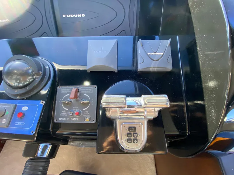 Slide: The Image of Control panel of a 2007 Rodriquez 80 Widebody yacht with navigation equipment. - 45