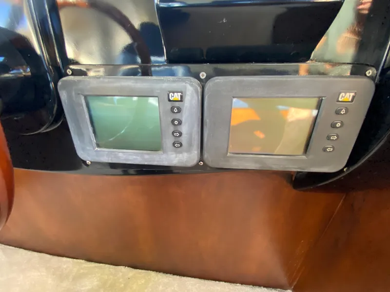 Slide: The Image of Control panel of a 2007 Rodriquez 80 Widebody yacht with dual CAT displays. - 46