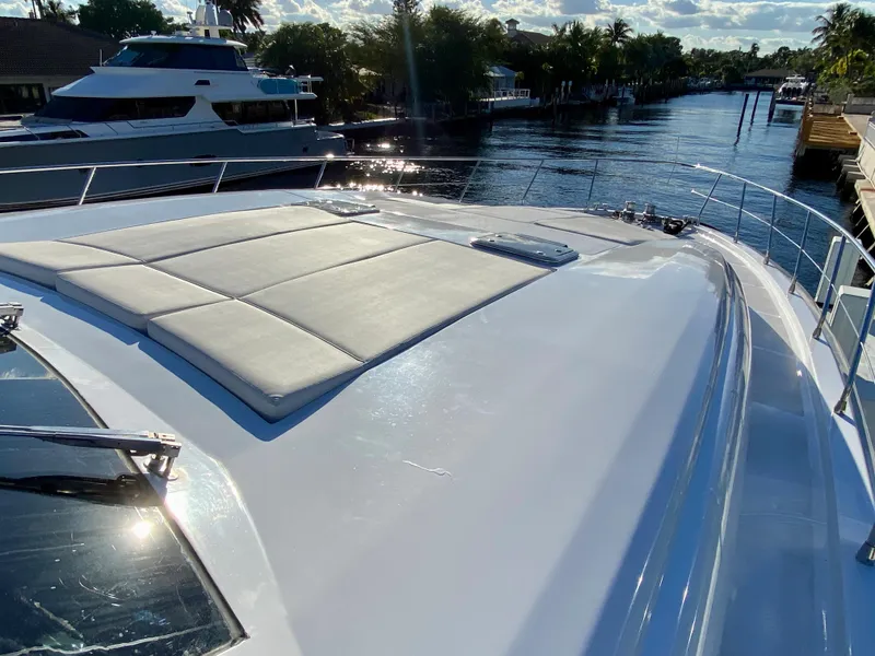 Slide: The Image of Luxurious 2007 Rodriquez 80 Widebody yacht with spacious sun deck on a serene waterway. - 9