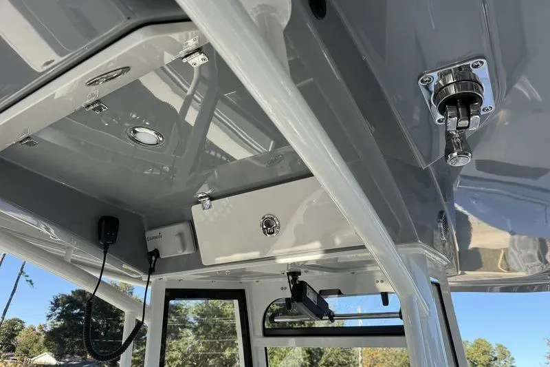 Slide: The Image of 2026 Cobia 265 Open Center Console boat interior, featuring sleek design and modern equipment. - 15